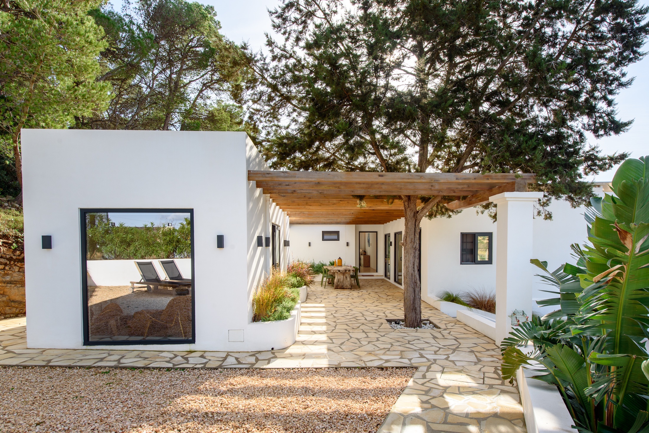 Resa Estates Ibiza villa for sale es Cubells modern heated pool house side.jpg